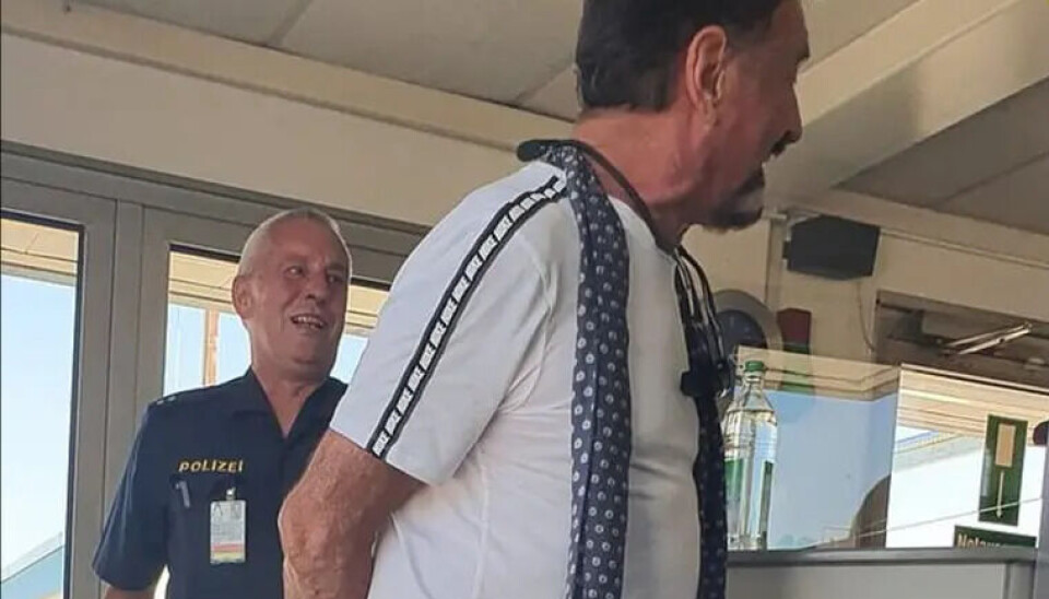 The German word «Polizei» is clearly visible on a police officer in one of the images McAfee shared on Twitter.